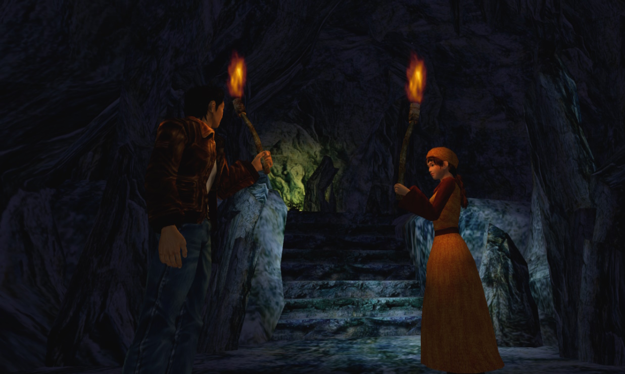 Still frame of Shenmue II showing Ryo and Shenhua in a cave at the end of the game.