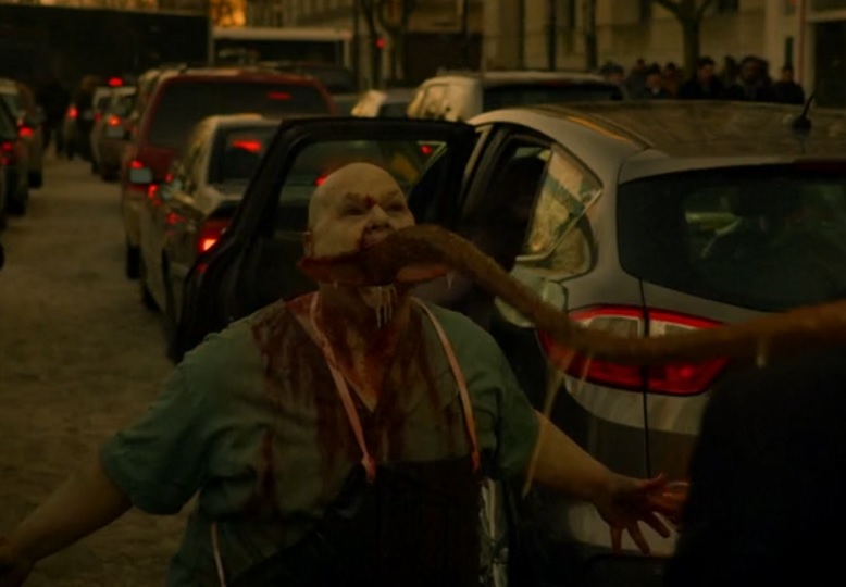 Still frame from The Strain showing a vampire.