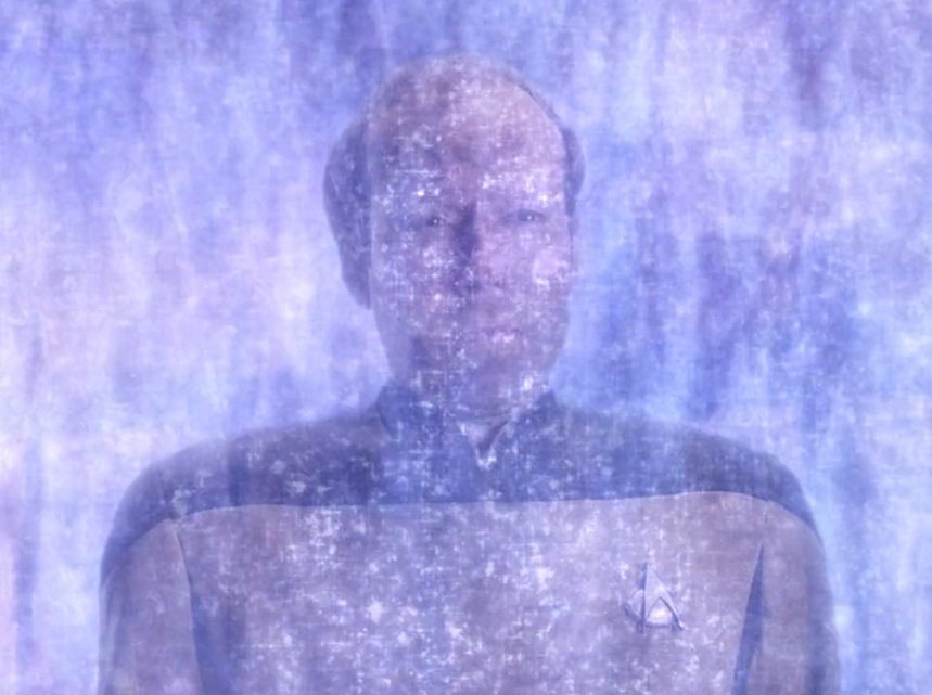 Still frame from Star Trek: TNG showing Barclay being transported.