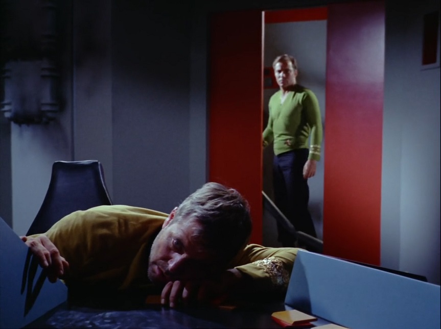 Still frame from Star Trek: The Original Series showing Kirk discovering Decker.