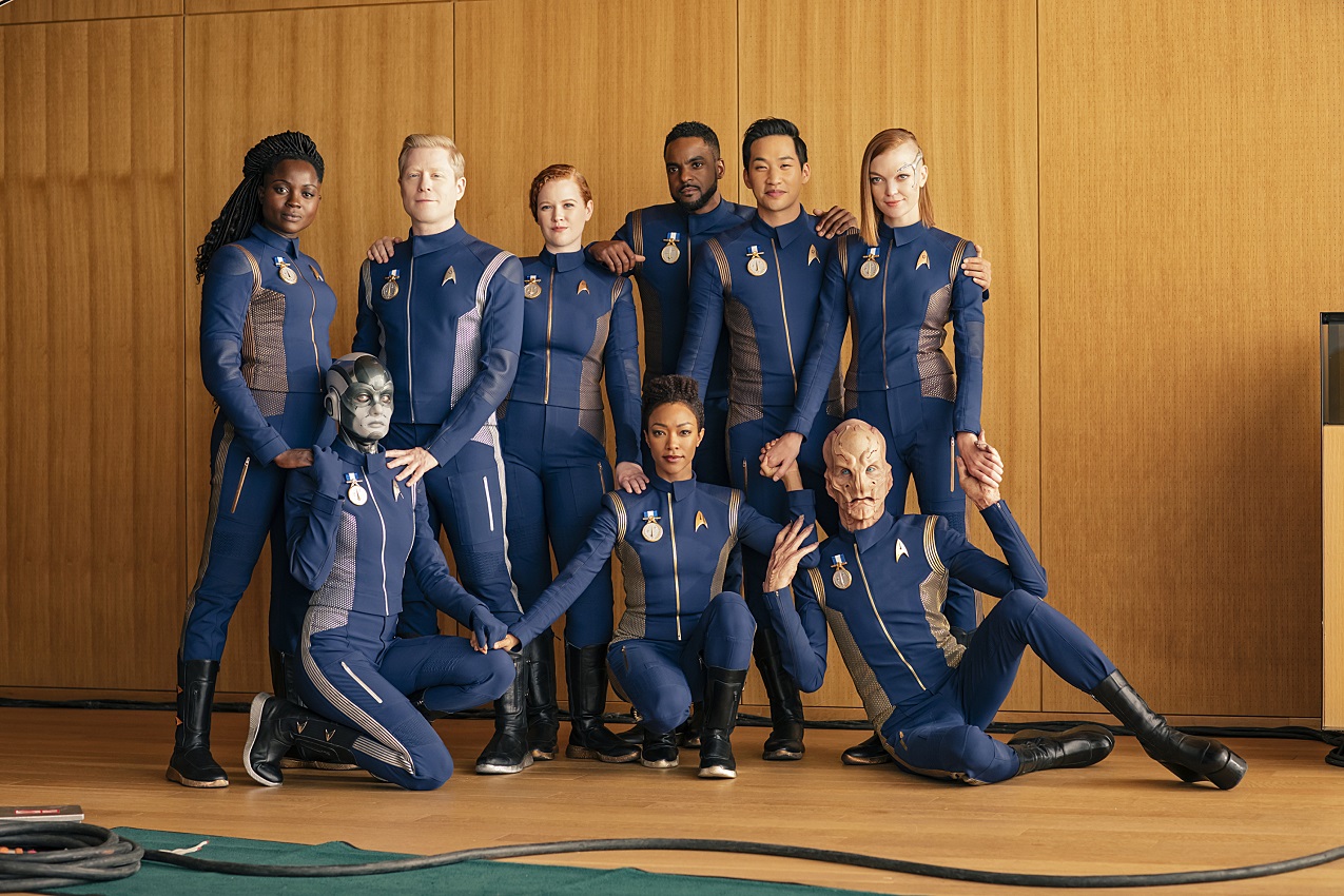 The main cast of Discovery Season 1 in a promotional photograph.