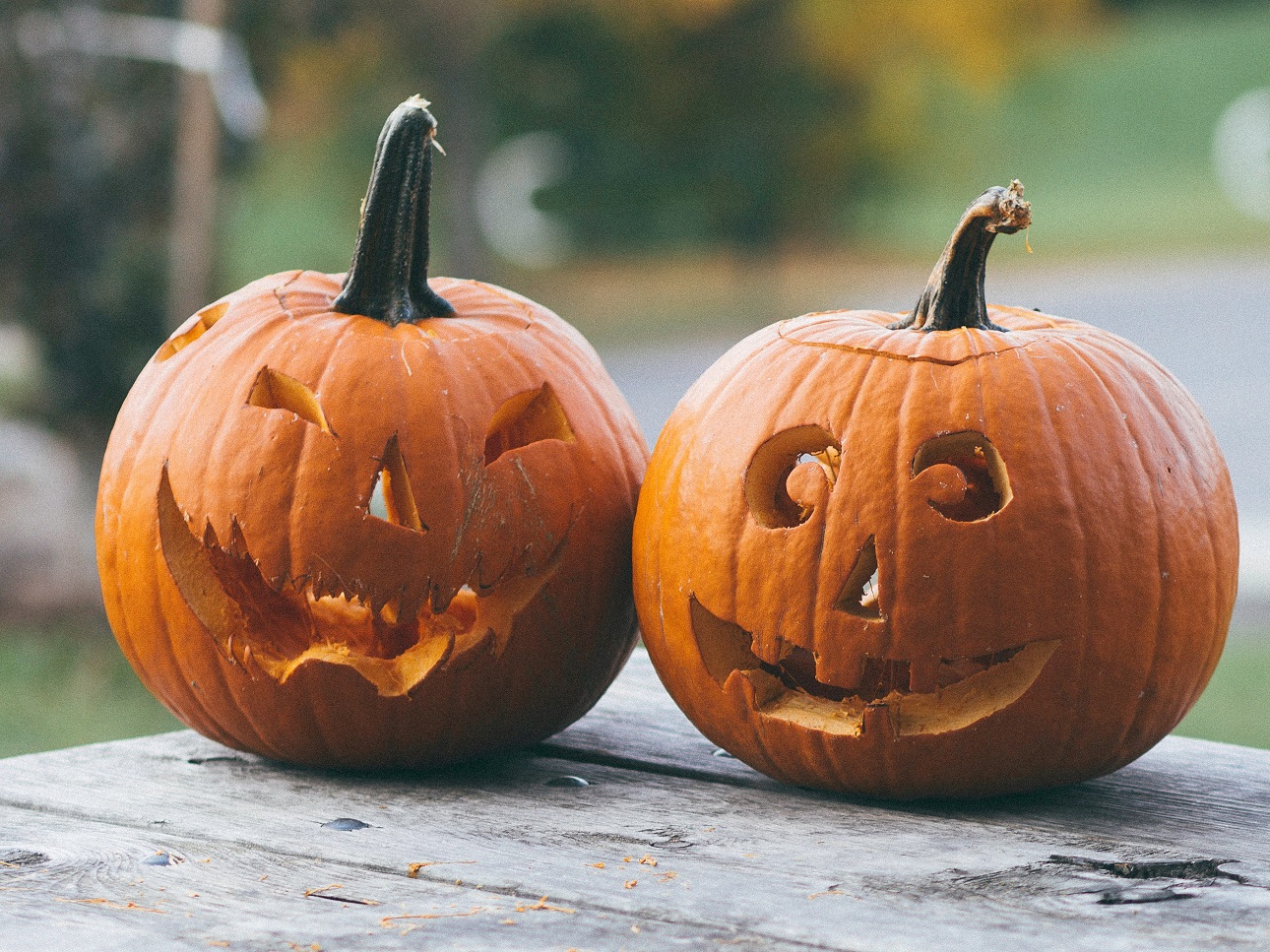Stock photo of two Jack-o-lanterns.