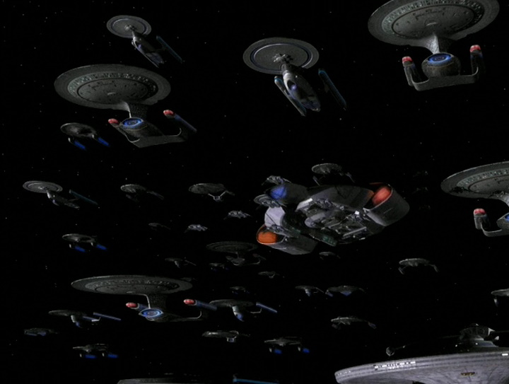 Still frame from Star Trek DS9 showing a fleet of ships