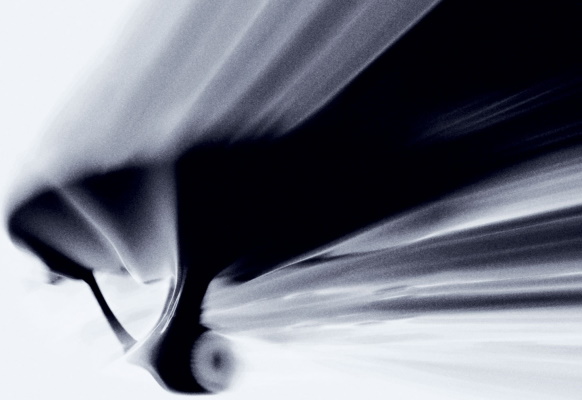 Cropped promo image for Star Trek 2009 showing the USS Enterprise in sillhouette.