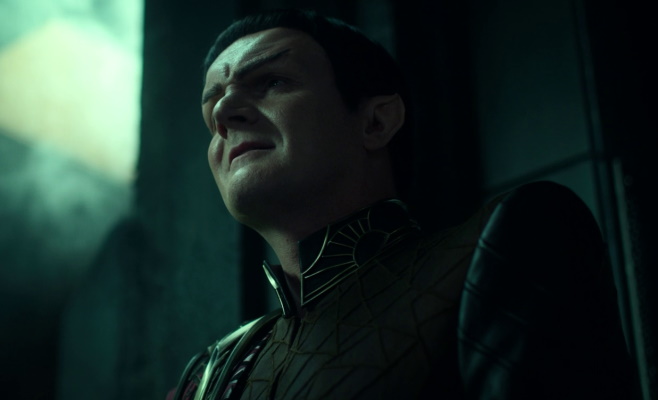 Still frame from Star Trek: Strange New Worlds showing a Romulan commander.