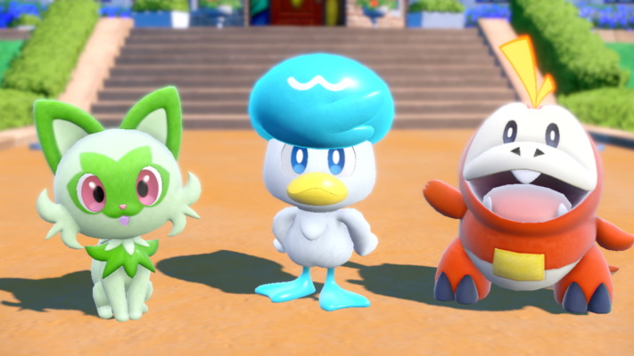 Promo screenshot of Pokemon Scarlet or Pokemon Violet showing the three starter Pokemon.