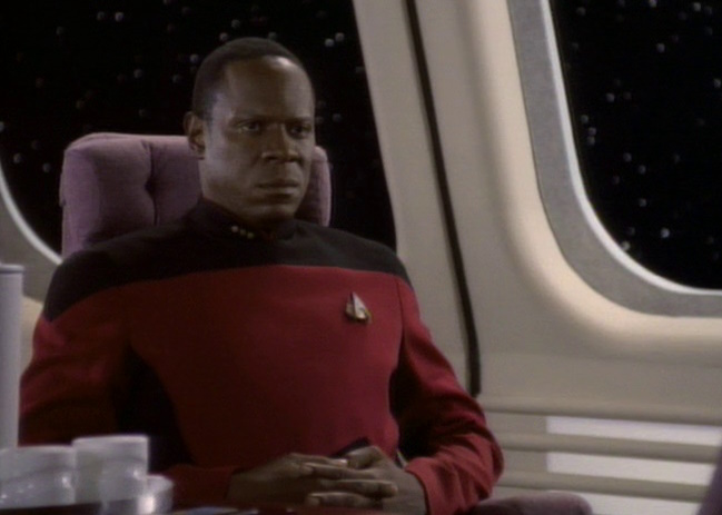 Still frame from Star Trek: Deep Space Nine Season 1 showing Commander Sisko aboard the Enterprise-D.