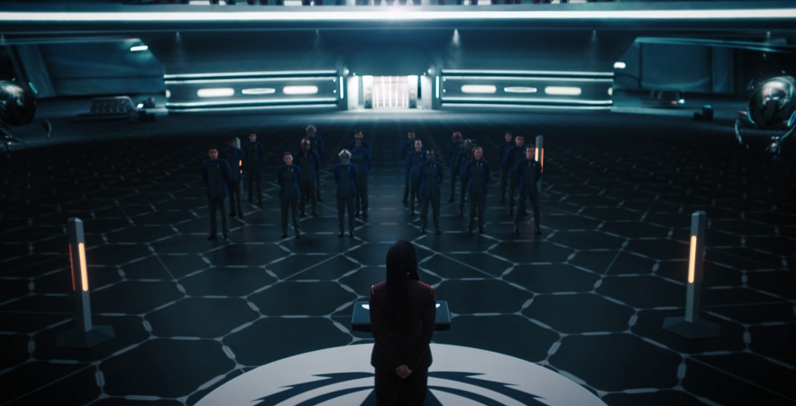 Still frame from the Discovery Season 4 premiere showing Burnham addressing a class of Starfleet Academy cadets.