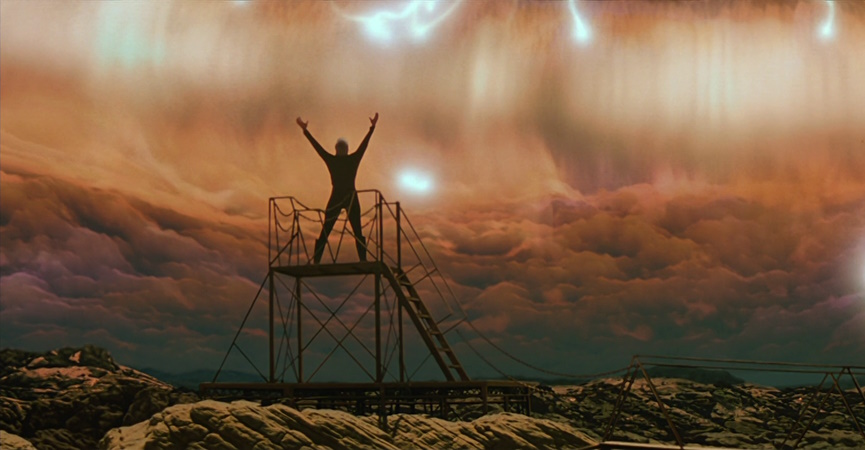 Still frame from Star Trek: Generations showing the Nexus approaching Soran, who has his arms raised.