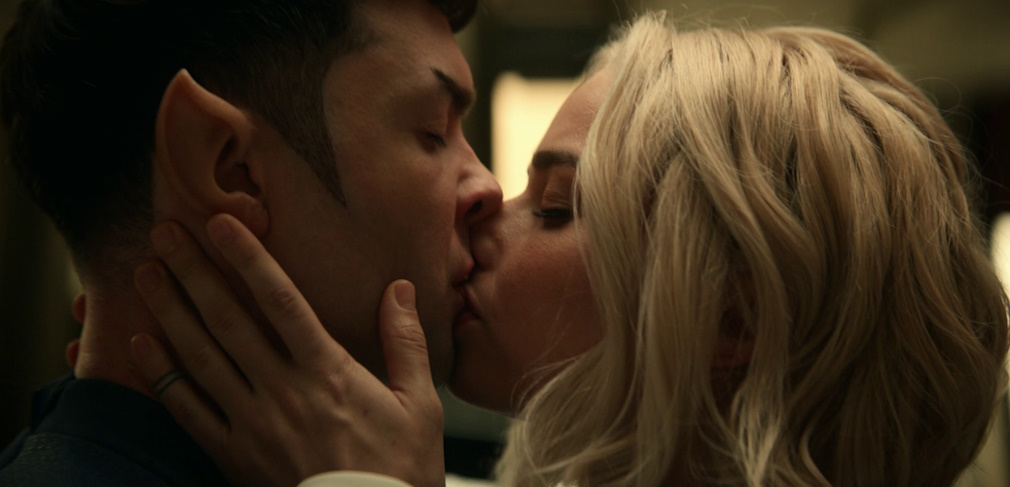 Still frame from Charades showing Spock and Chapel kissing