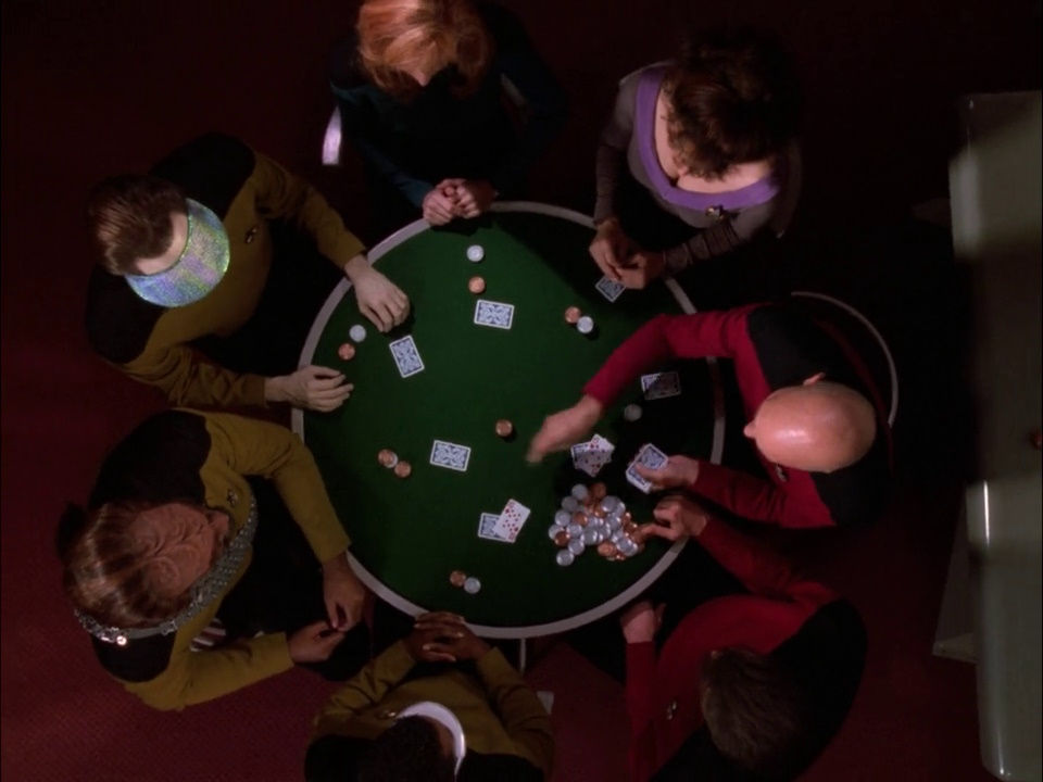 Still frame from "All Good Things," the series finale of Star Trek: The Next Generation, showing the main characters playing poker.