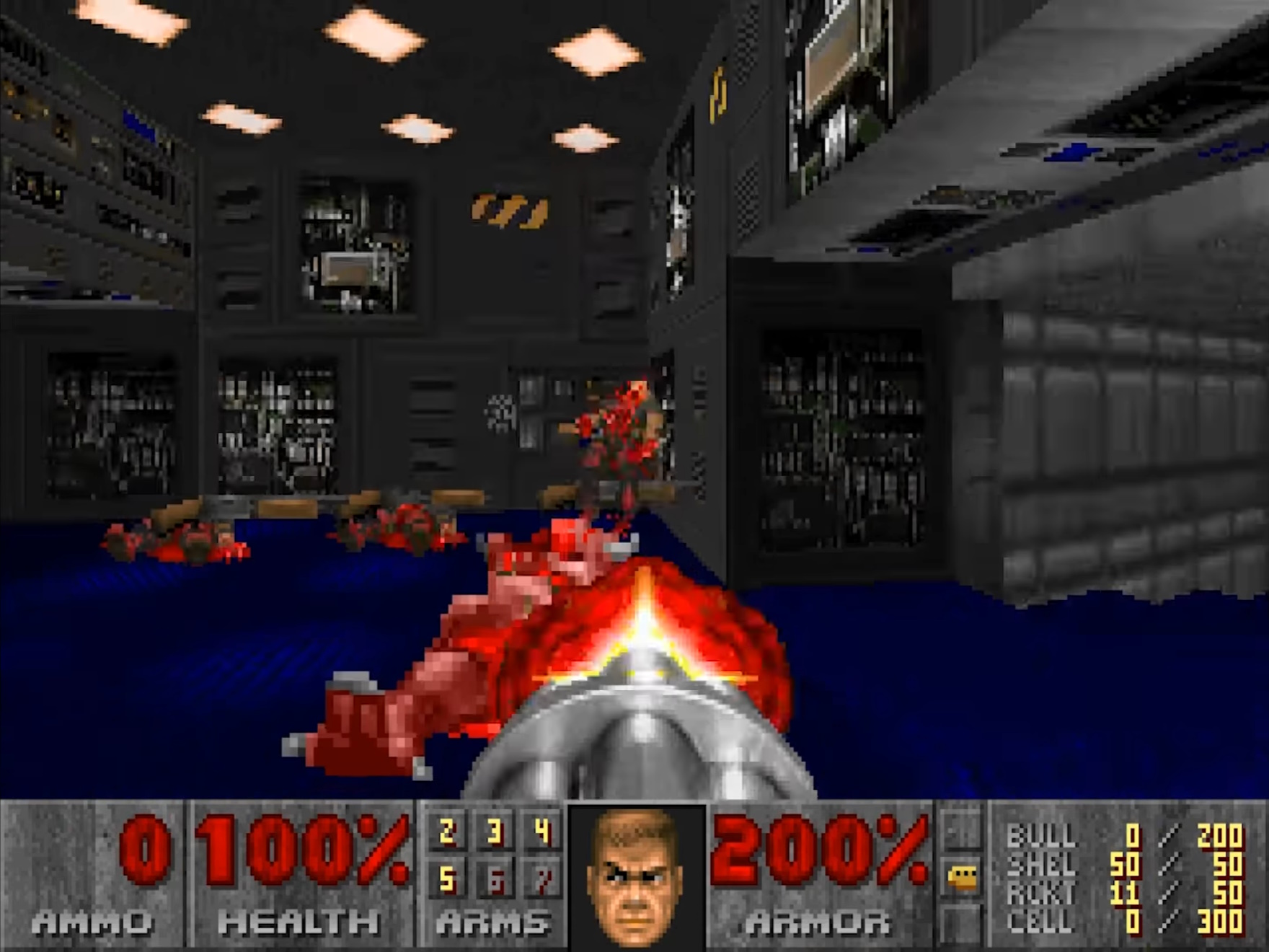 Screenshot from Doom (1993) showing a gun being fired.