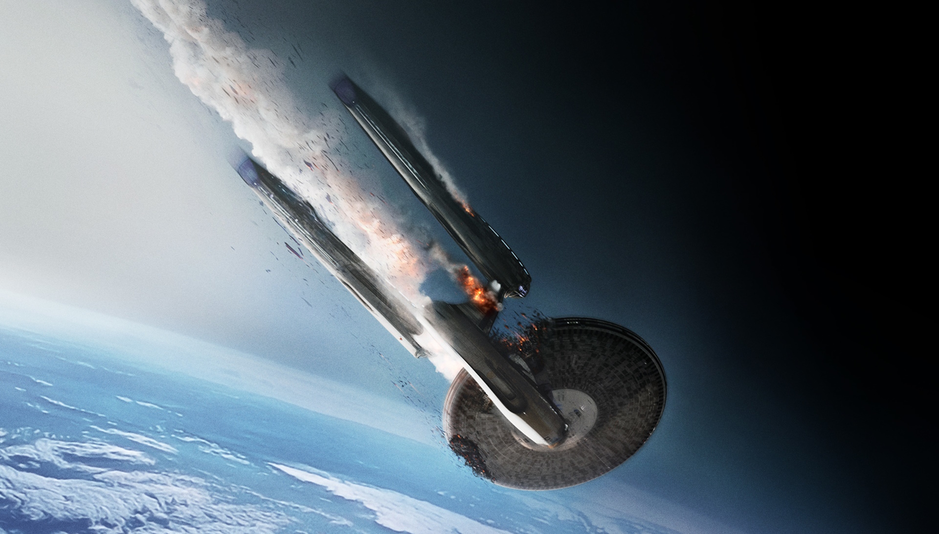 Cropped promo poster for Star Trek Into Darkness showing the USS Enterprise crashing into the atmosphere of a planet.