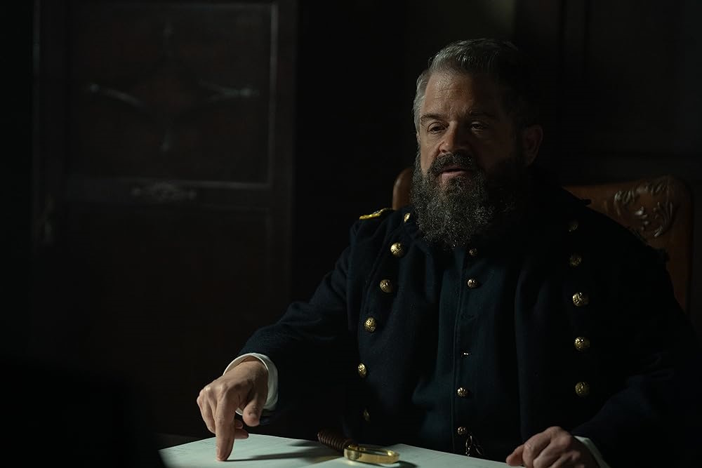 Promo photo of Patton Oswalt in Manhunt (2024).