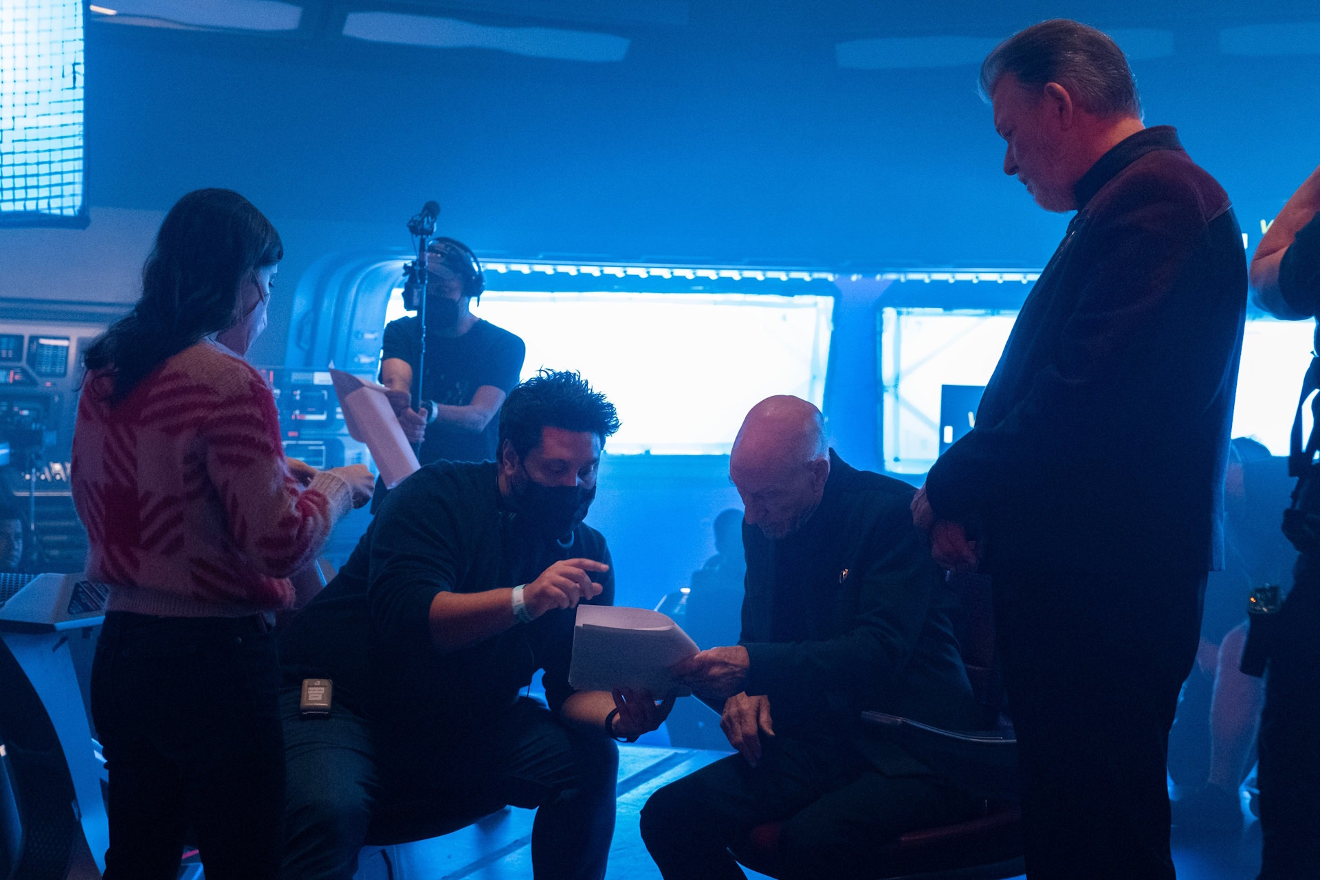 Behind-the-scenes photo from Star Trek: Picard Season 3 showing Sir Patrick Stewart, Jonathan Frakes, and others.