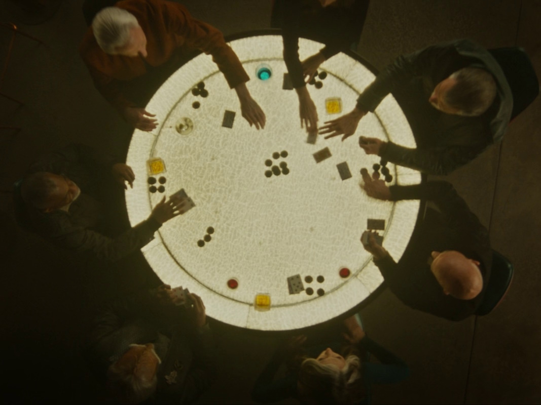 Still frame from "The Last Generation," the series finale of Star Trek: Picard, showing the main characters playing poker.