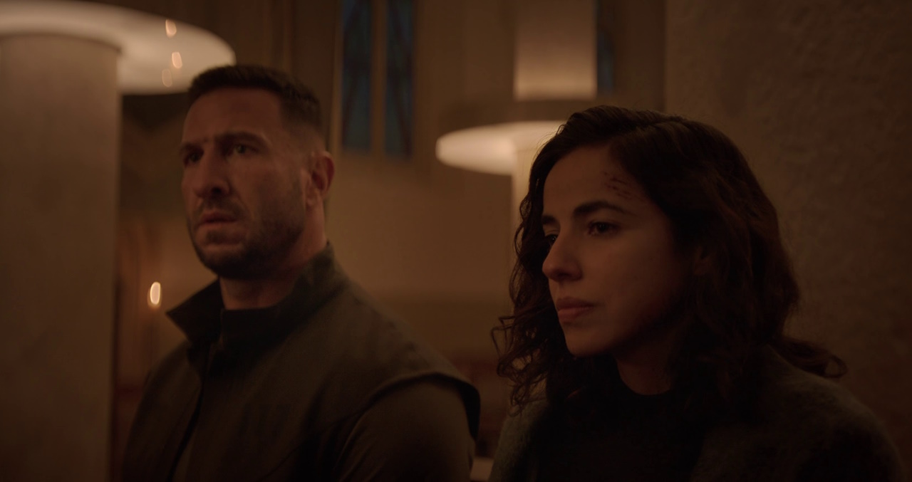 Still frame of Halo Season 2 (2024) showing the Master Chief and Perez in a chapel.