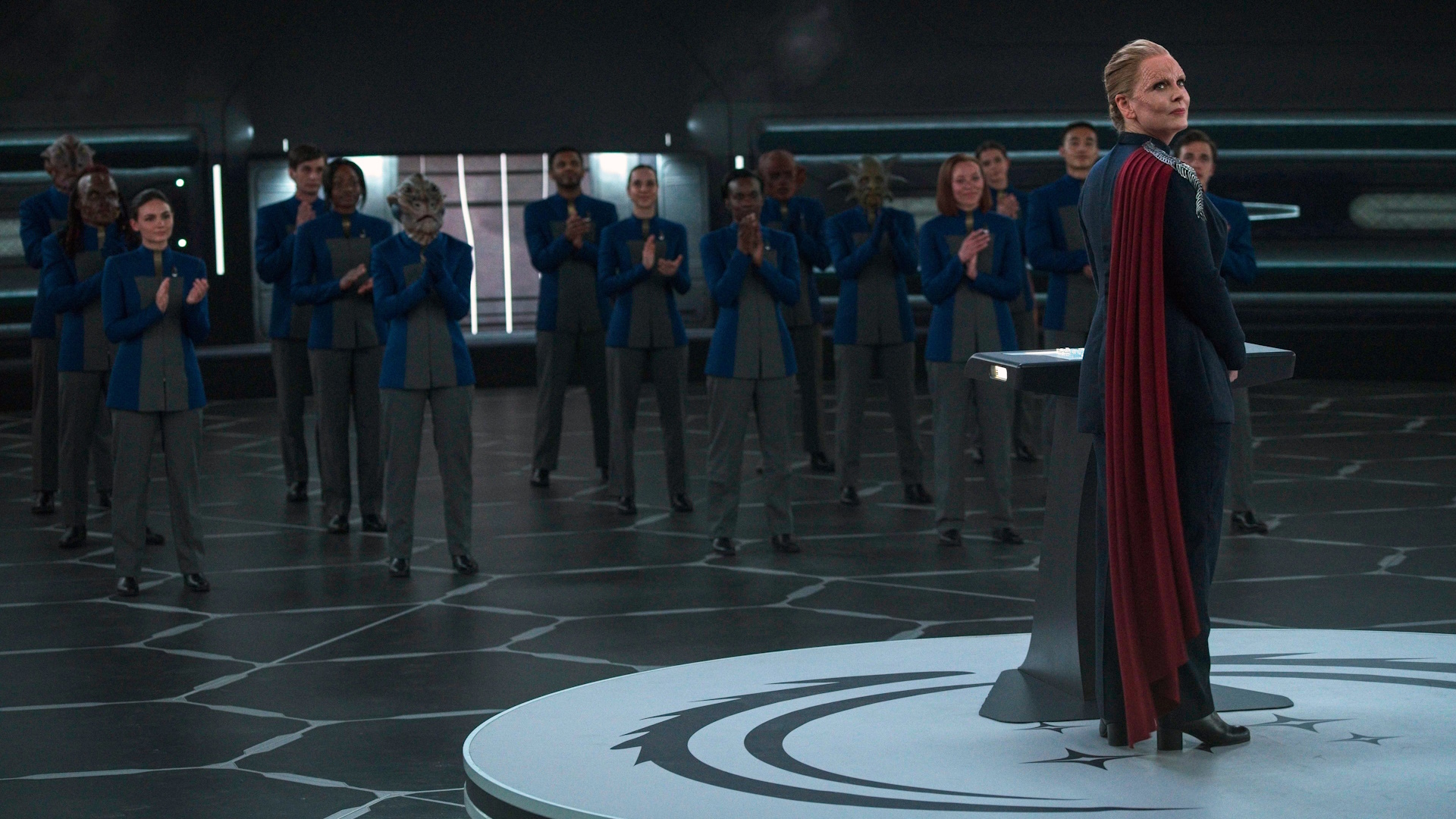 Promo photo from Star Trek: Discovery showing President Rillak and a class of Starfleet cadets.