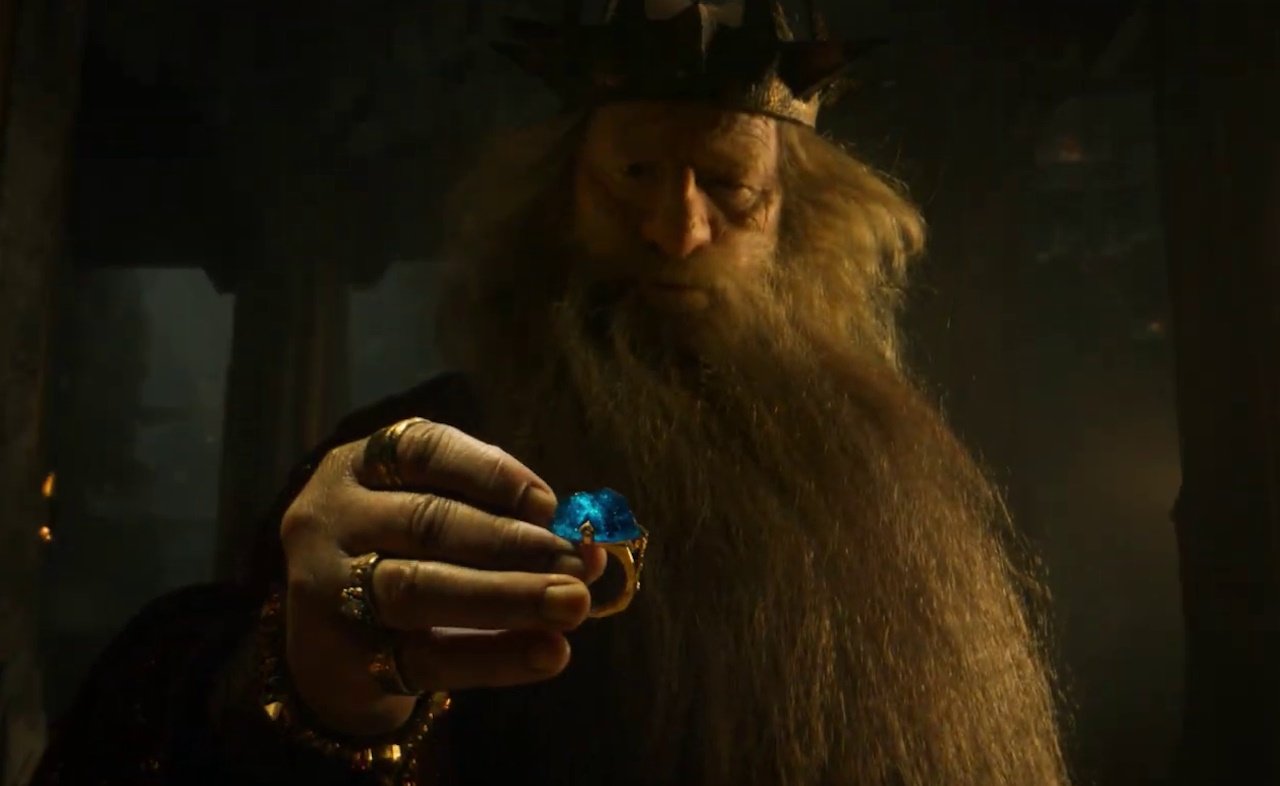 Still frame from The Rings of Power Season 2 trailer showing King Durin holding a ring.
