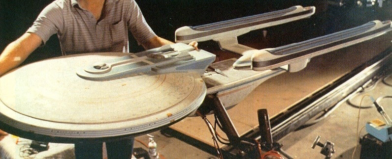 Behind-the-scenes photo from Star Trek III: The Search for Spock showing the filming model of the USS Excelsior.