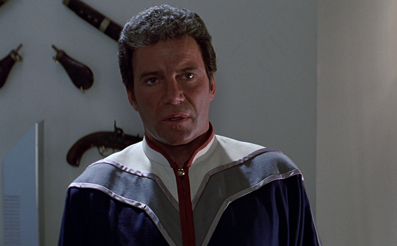 Still frame from Star Trek III: The Search for Spock showing Kirk out of uniform at his home.