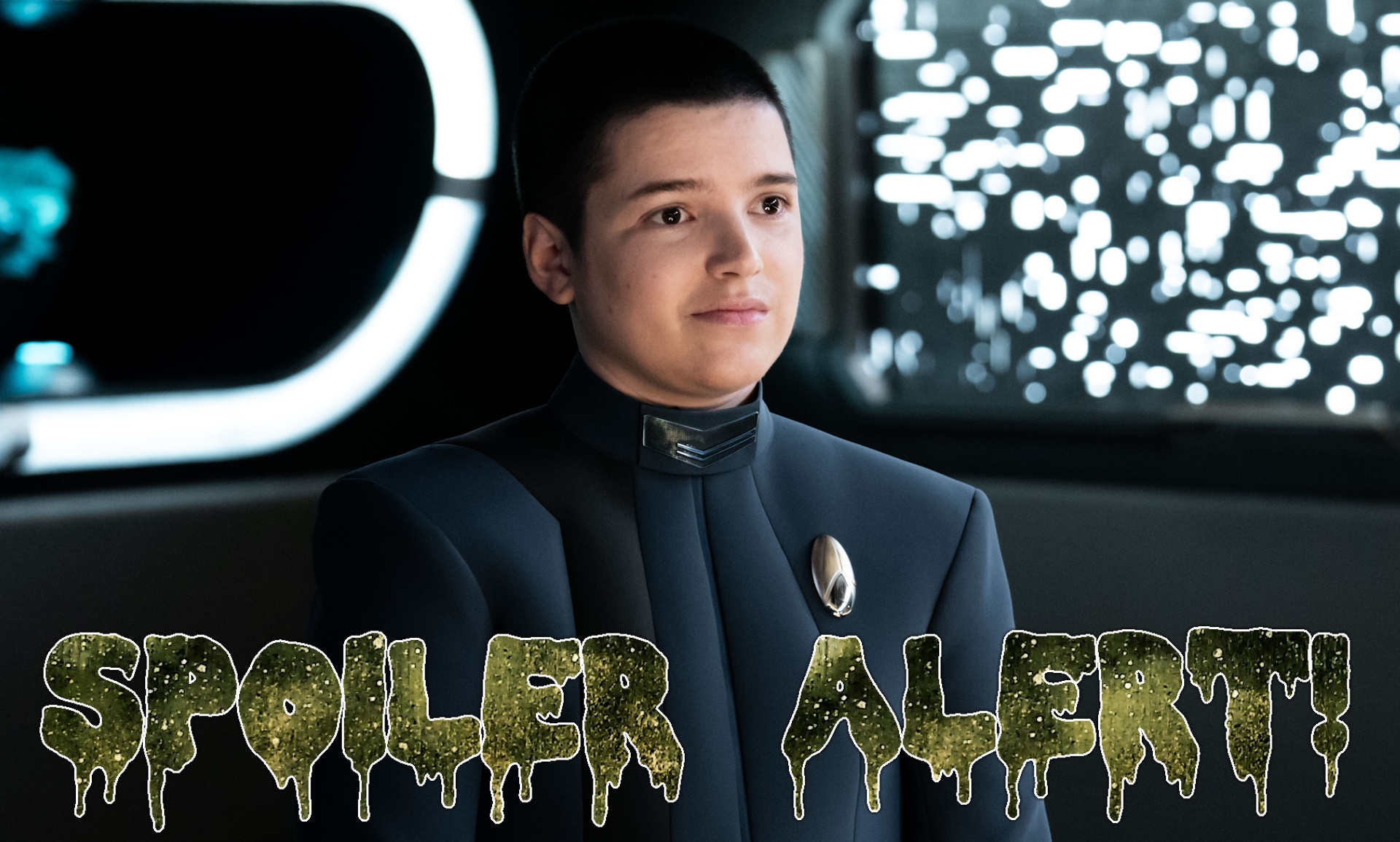 A spoiler warning graphic.