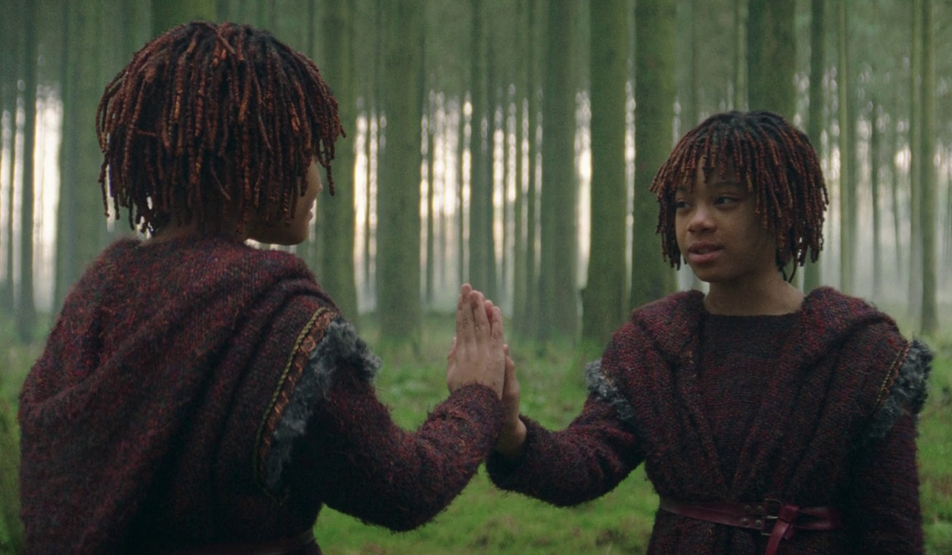 Still frame from Star Wars: The Acolyte showing young Osha and Mae.