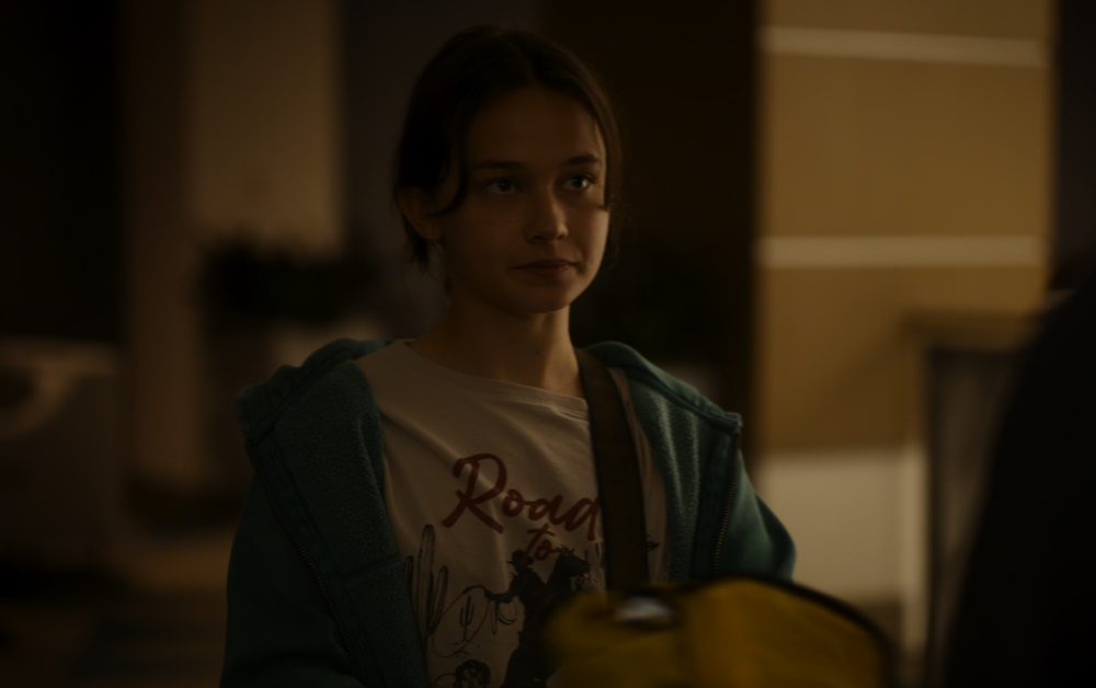 Still frame from Civil War (2024) showing the character of Jessie.