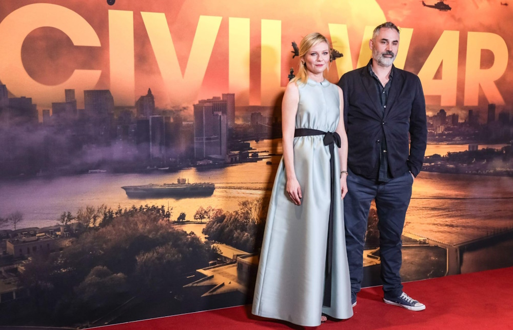 Photo from the premiere of Civil War (2024) showing star Kirsten Dunst and director Alex Garland.