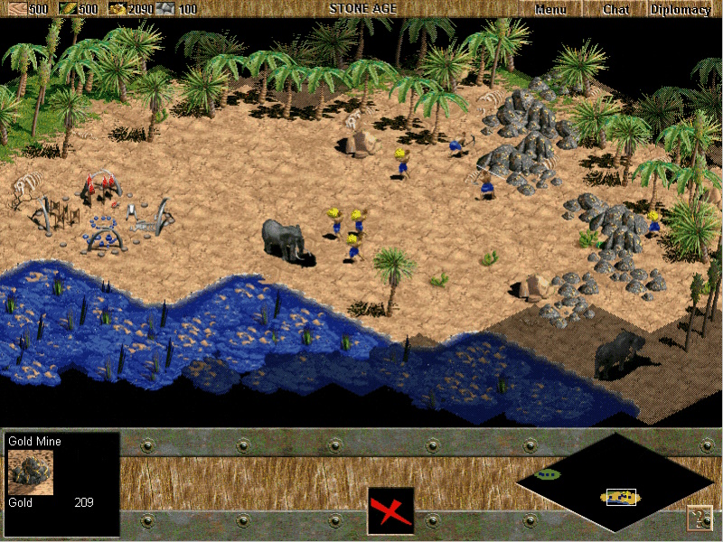 Screenshot of Age of Empires (1997) showing villagers mining gold.