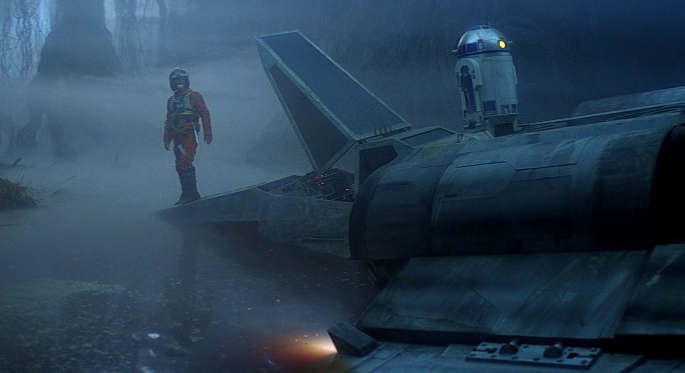 Still frame from The Empire Strikes Back (1980) showing Luke Skywalker's crashed X-Wing.
