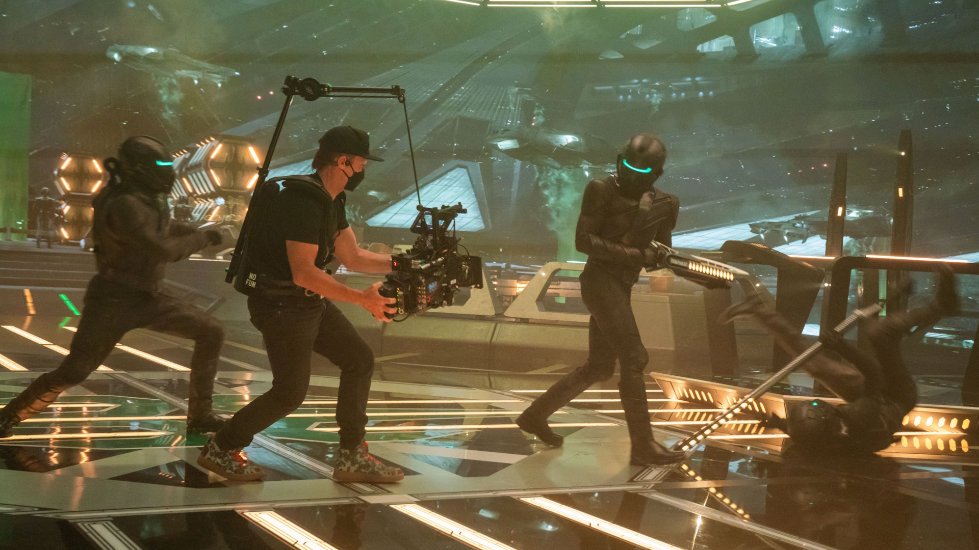 Behind-the-scenes on Discovery Season 5 showing a camera operator and several characters in costume.