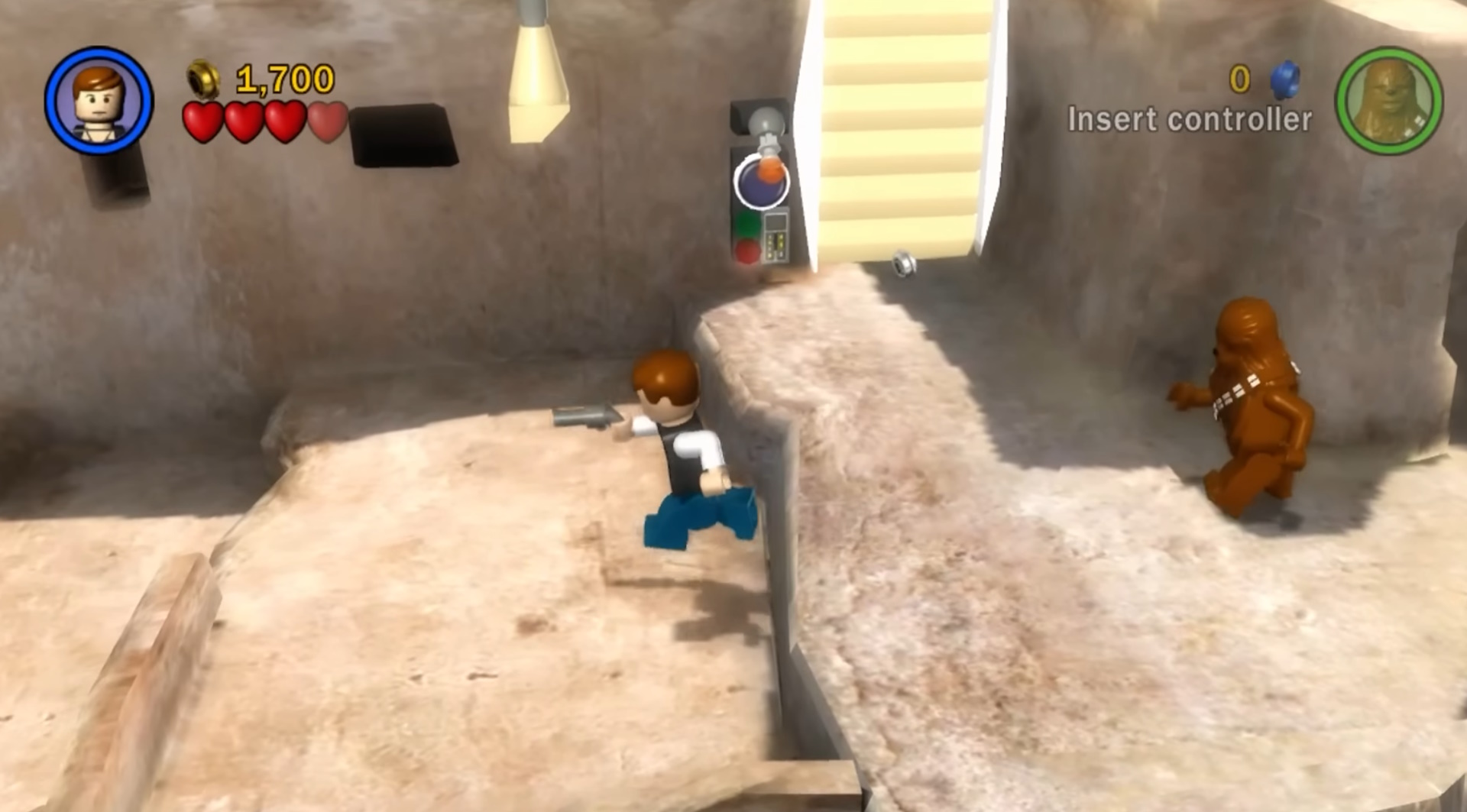 Screenshot of Lego Star Wars: The Complete Saga (2007) showing two characters on Tatooine.