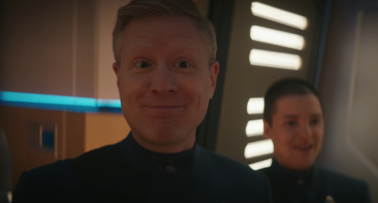 Still frame from Star Trek: Discovery Season 5 (2024) showing Stamets with Adira in the background.
