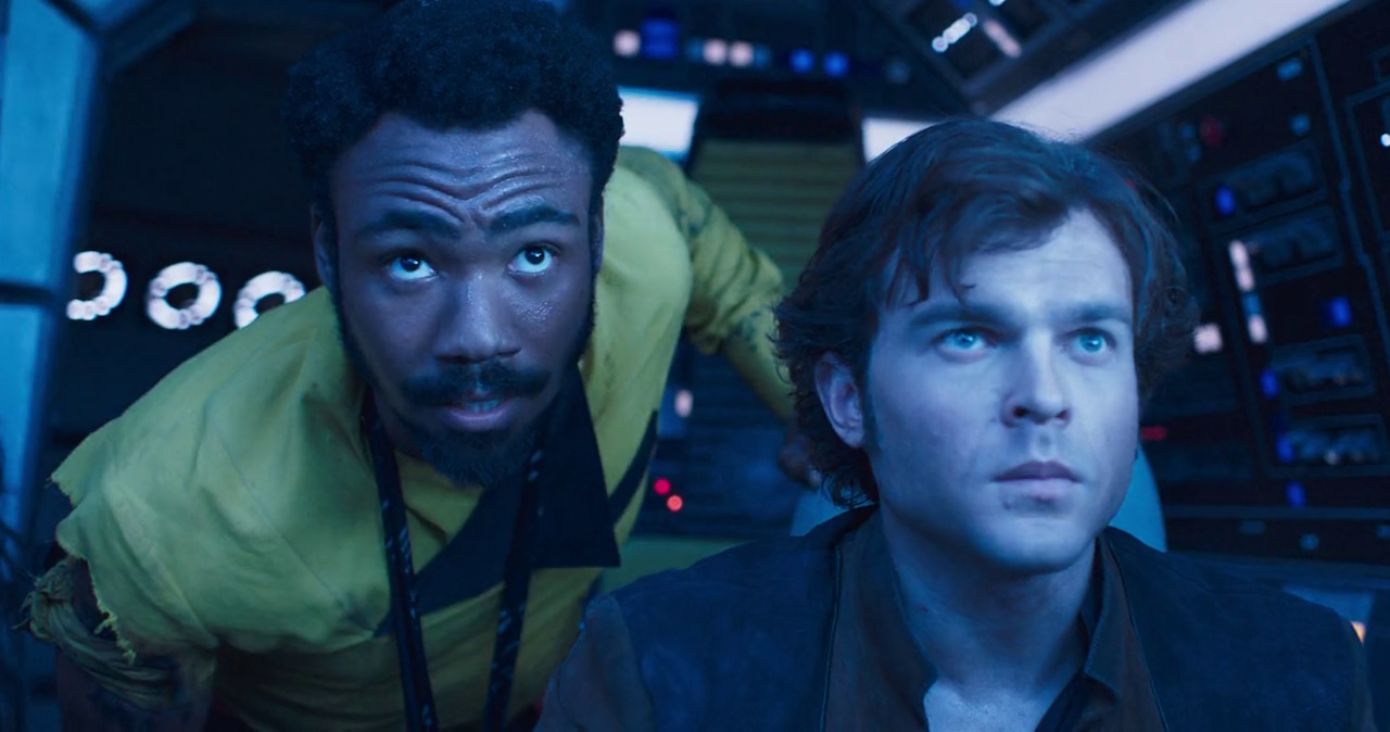 Still frame from Solo: A Star Wars Story (2018) showing Lando and Han in the cockpit.