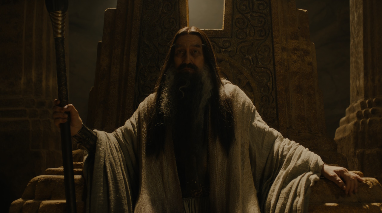 Still frame from The Lord of the Rings: The Rings of Power Season 2 (2024) showing the Dark Wizard on his throne.