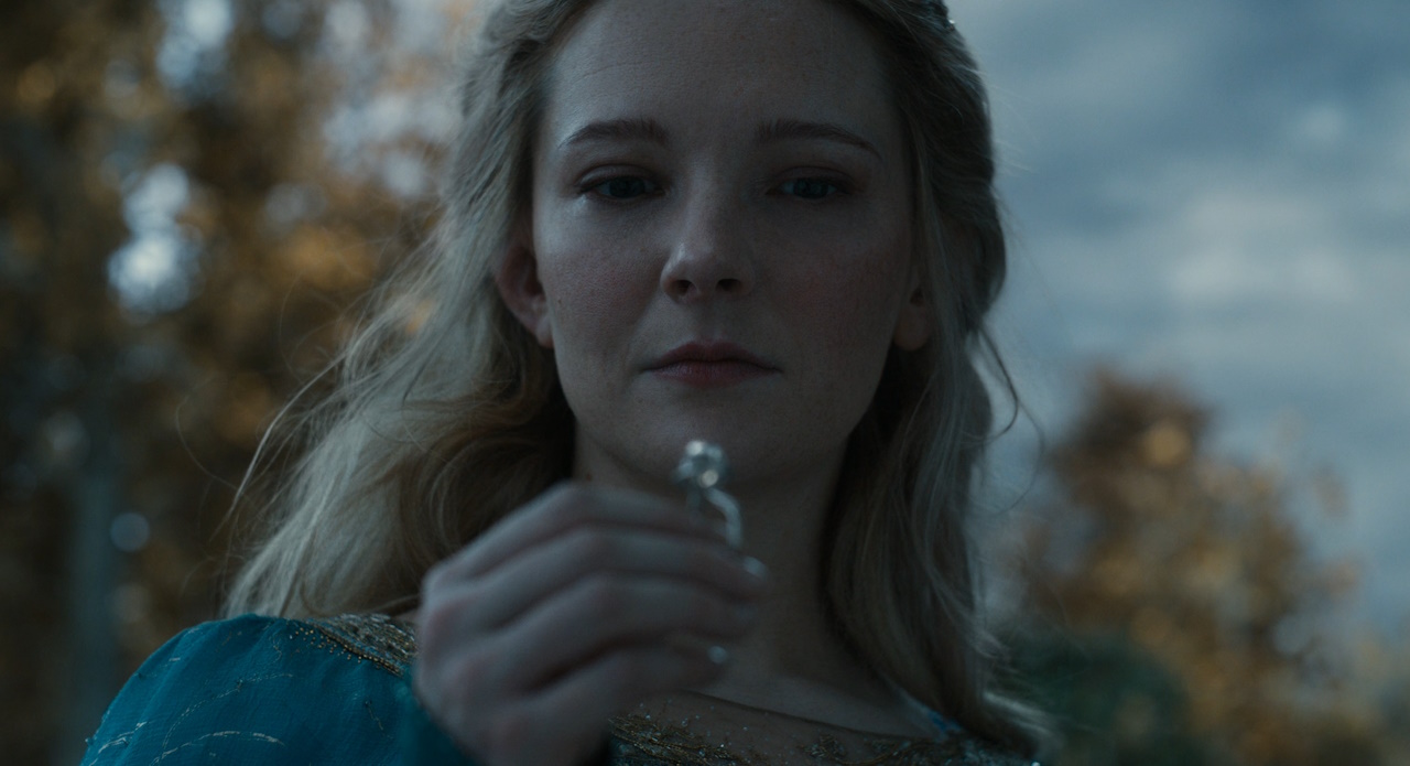 Still frame from The Rings of Power showing Galadriel and her ring.