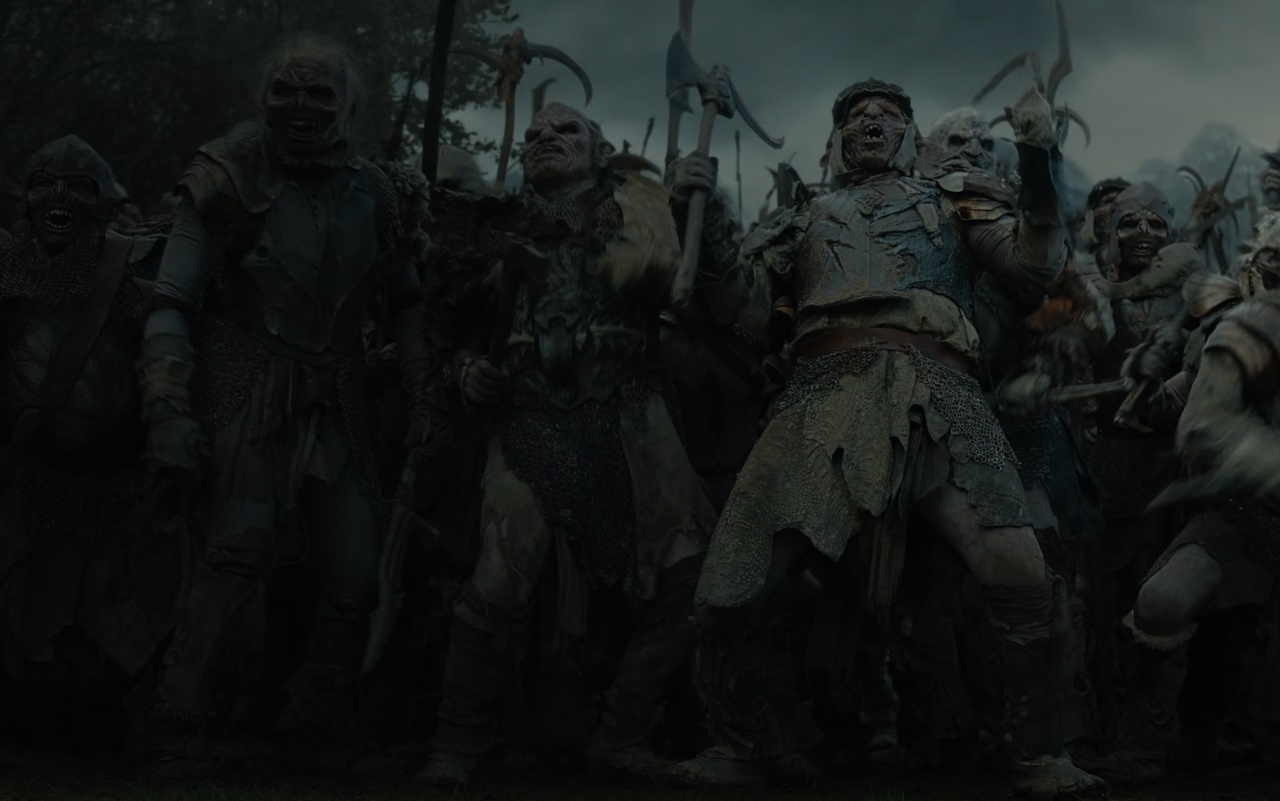 Still frame from The Lord of the Rings: The Rings of Power Season 2 (2024) showing an army of Orcs.