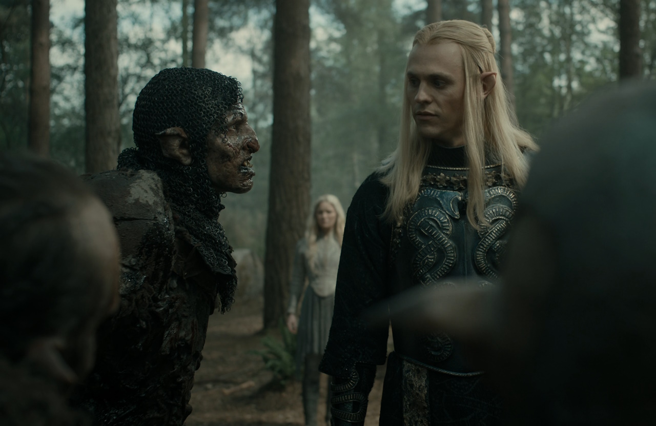 Still frame from The Lord of the Rings: The Rings of Power Season 2 (2024) showing Sauron and Orcs with Galadriel in the background.
