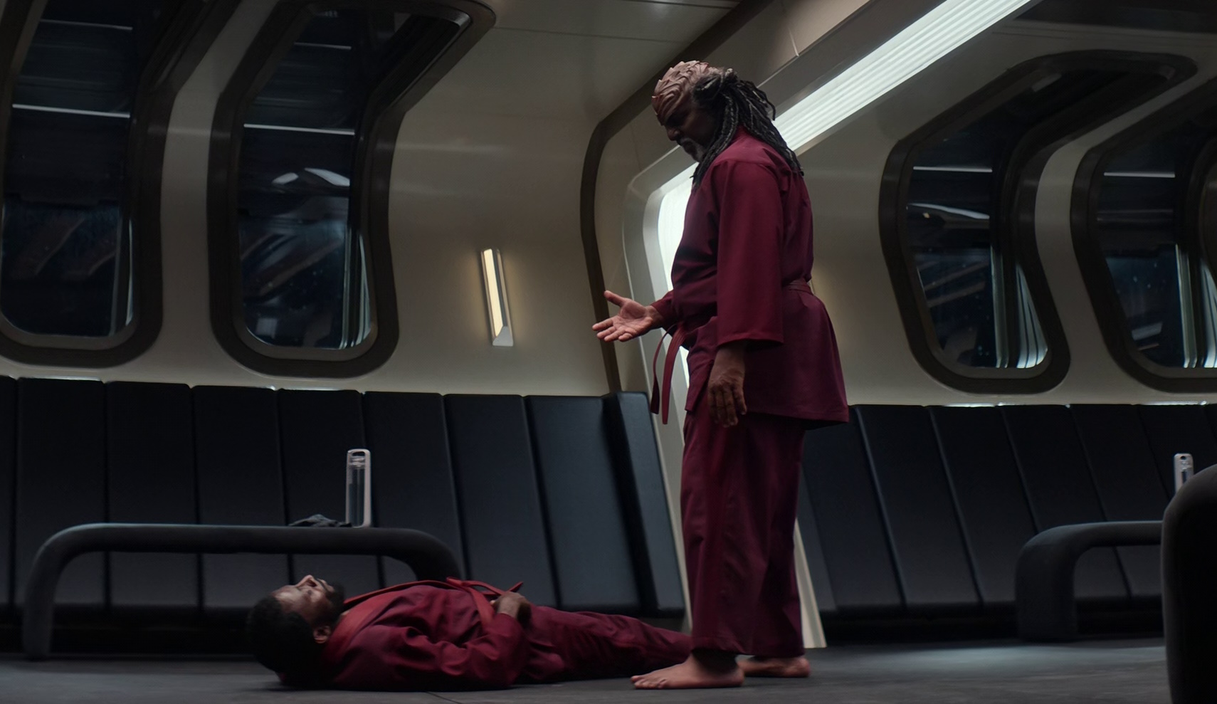 Still frame from Star Trek: Strange New Worlds Season 2 (2023) showing Dr M'Benga and Ambassador Rah sparring.