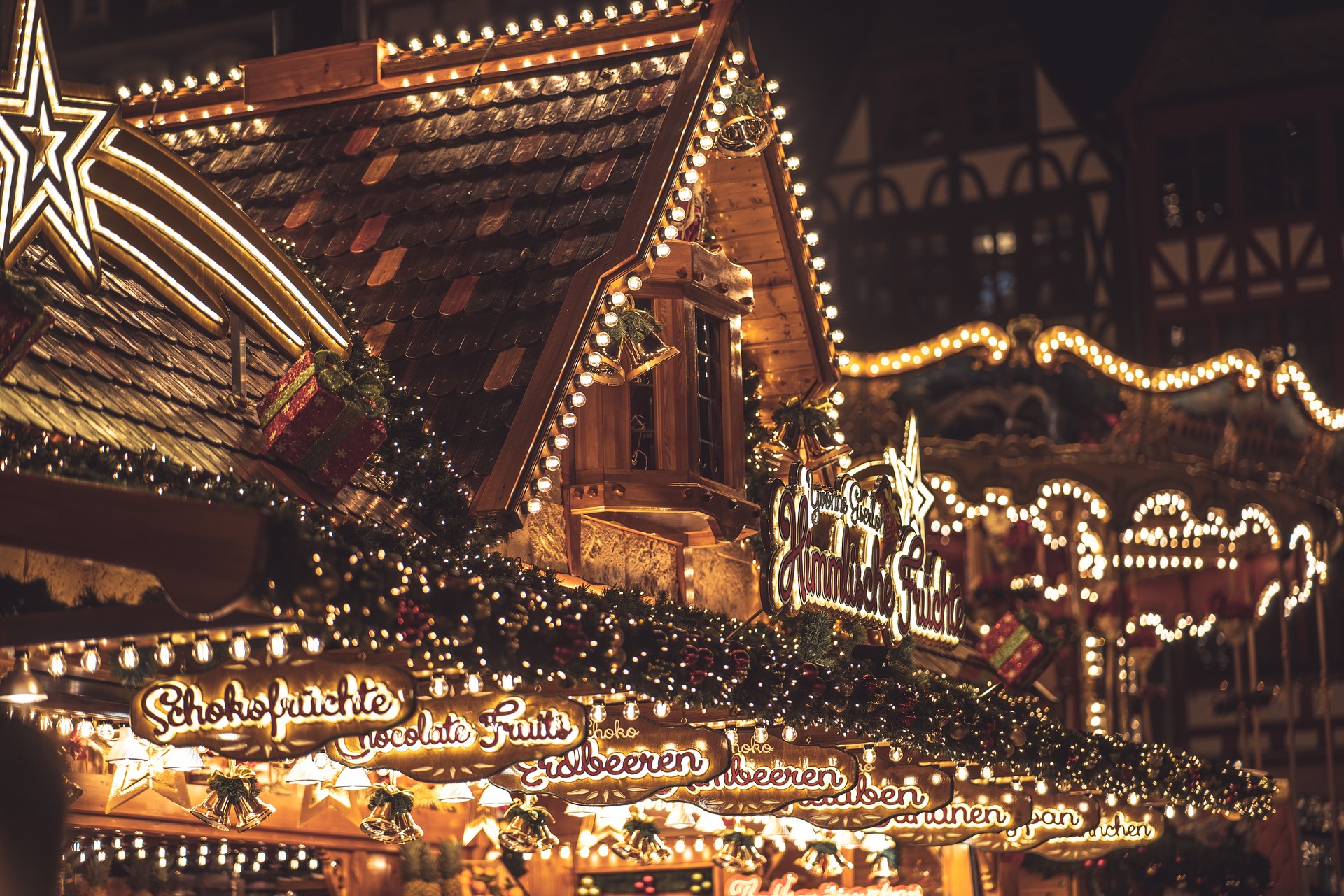 A photograph of an illuminated stall at the Christmas Market in Frankfurt.