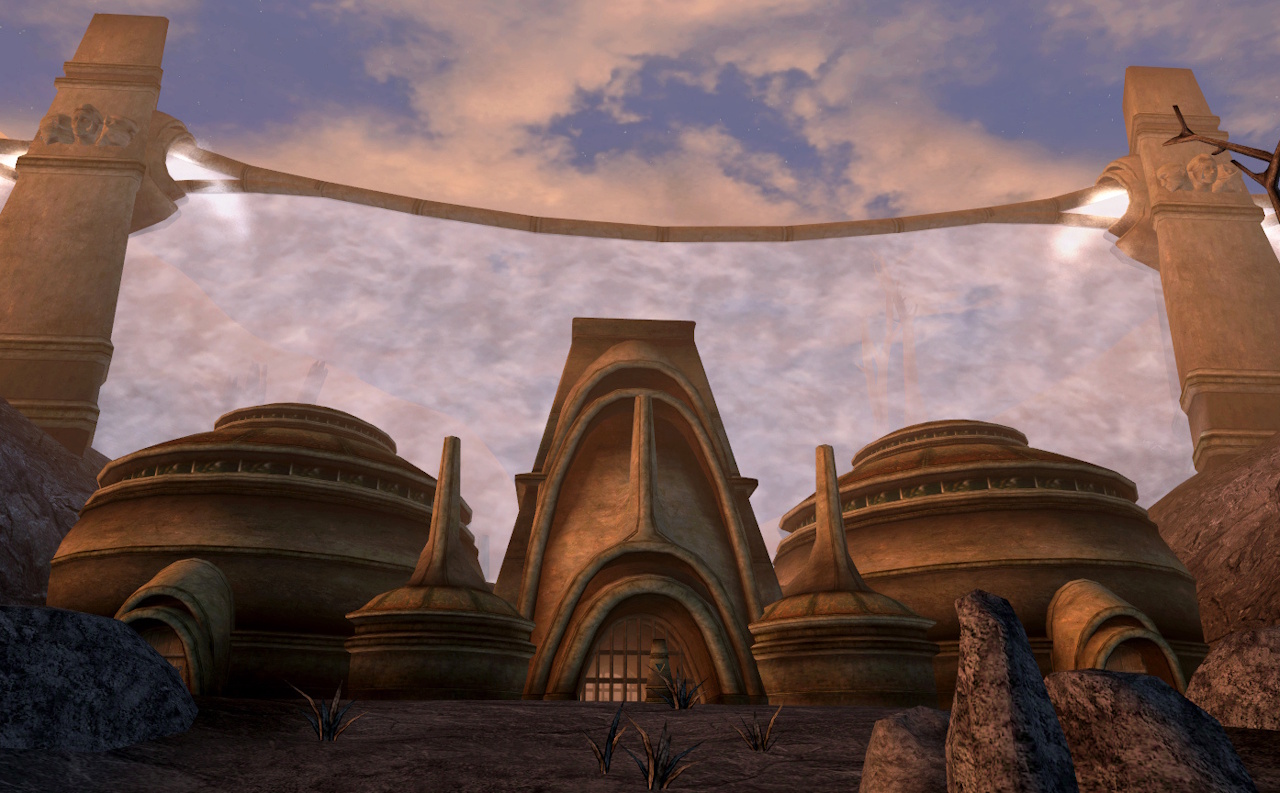 Screenshot of Morrowind showing the settlement of Ghostgate (two buildings, a gateway, and a magical fence).