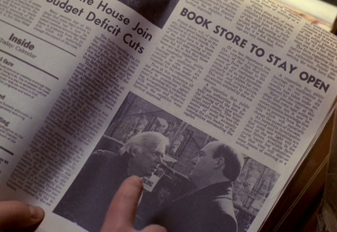 Still frame from Star Trek: Voyager showing a newspaper article about Mr Janeway's bookshop.