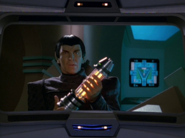 Still frame from Star Trek: Voyager showing a Romulan officer on Voyager's viewscreen.
