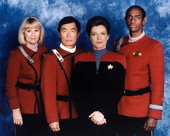 Promotional photo for Star Trek: Voyager Season 3, showing Rand, Sulu, Janeway, and Tuvok.