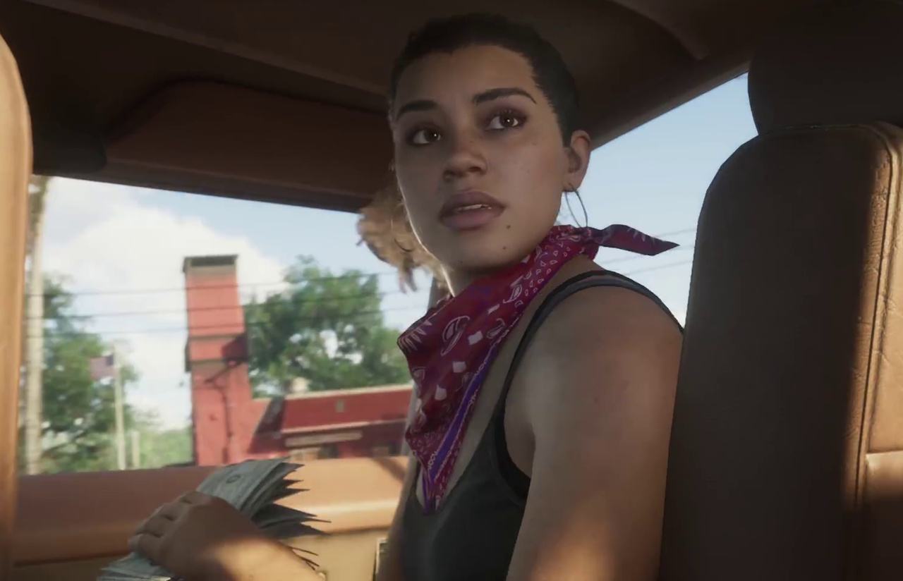 A still frame from the Grand Theft Auto VI trailer showing Lucia holding a wad of cash.