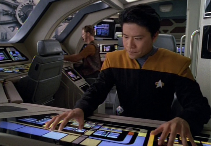 Still frame from Star Trek: Voyager showing Tom Paris and Harry Kim in a Starfleet runabout.