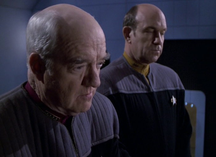 Still frame from Star Trek: Voyager showing Admiral Paris and Commander Harkins.