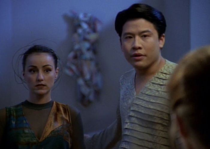 Still frame from Star Trek: Voyager showing Harry Kim and an alien in the episode Prime Factors.