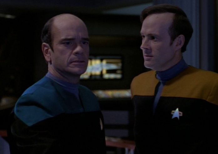 Still frame from Star Trek: Voyager showing the EMH and Barclay.